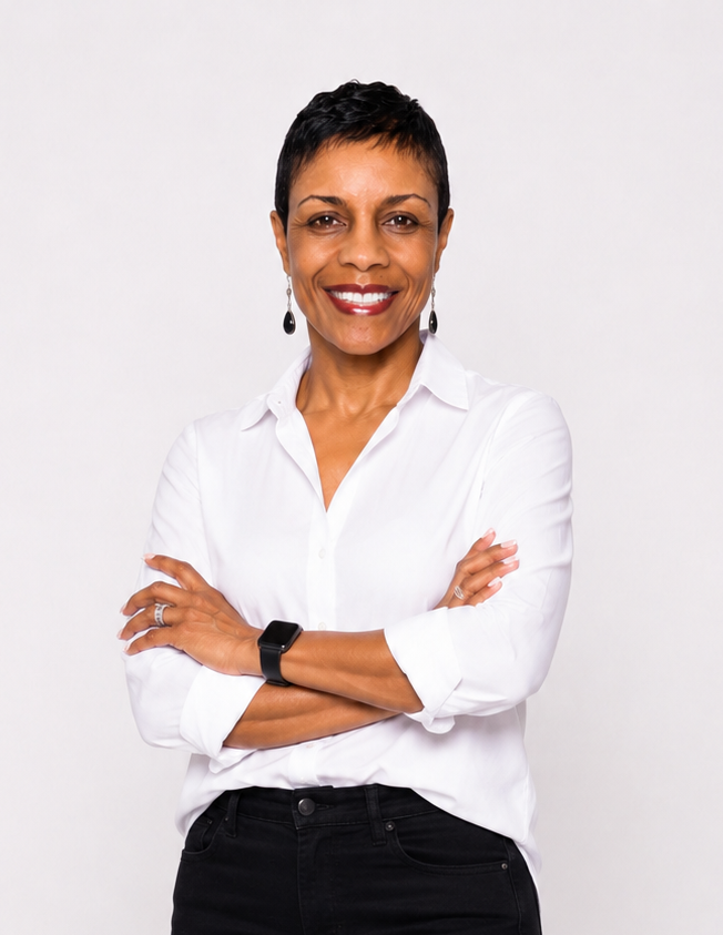 Jennifer Cornelius smiling in a white blouse